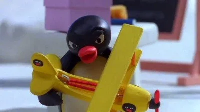 Pingu y el avión de motor a goma